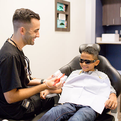 Image of your dentist in CITY using modern technology 