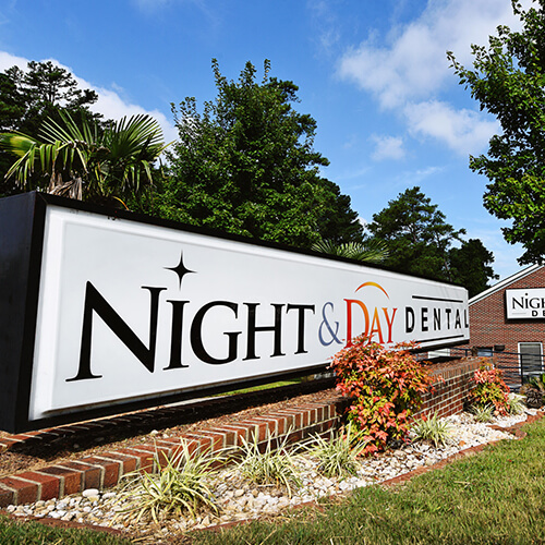 Giant Night & Day Dental sign